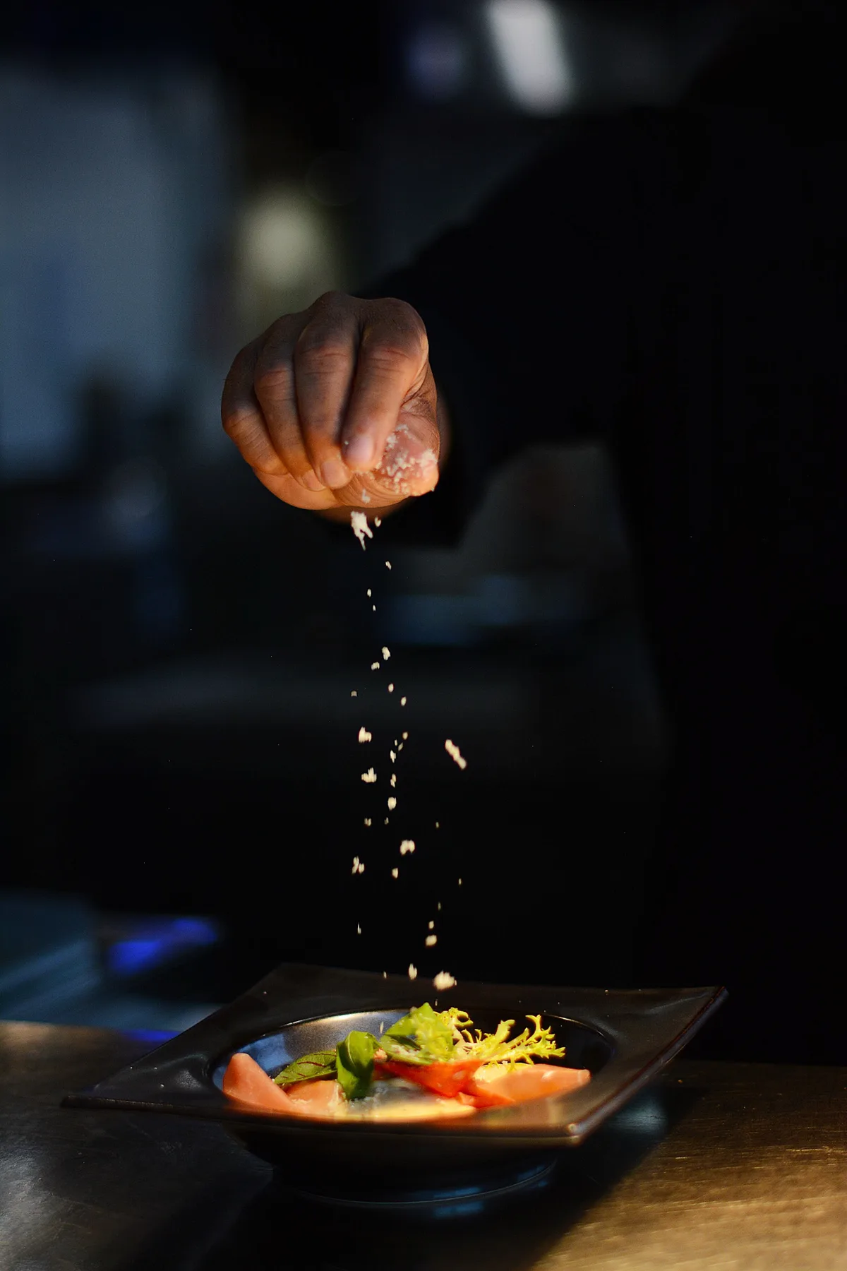 The final seasoning at the pass